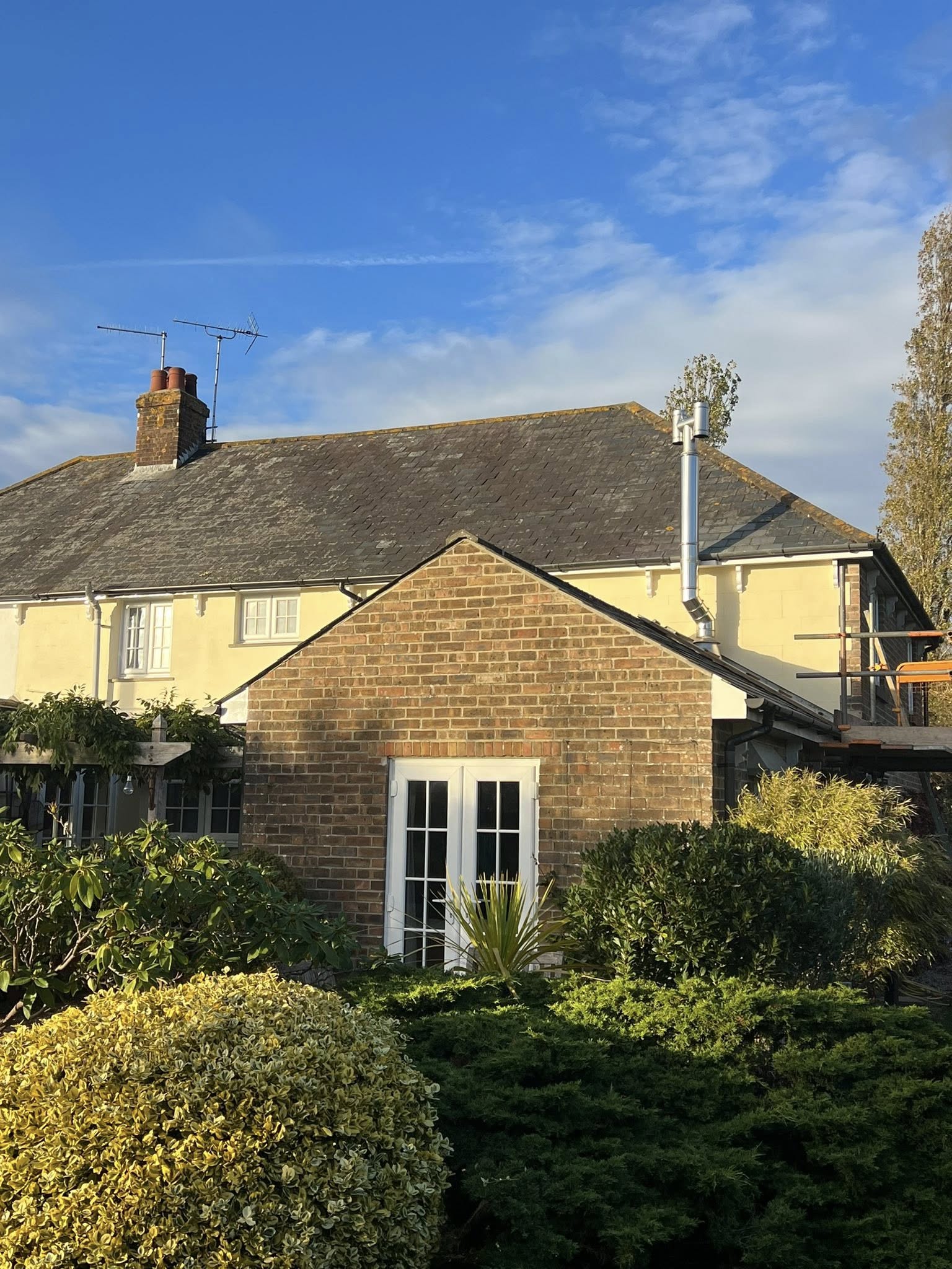 Cream and brick cottage exterior