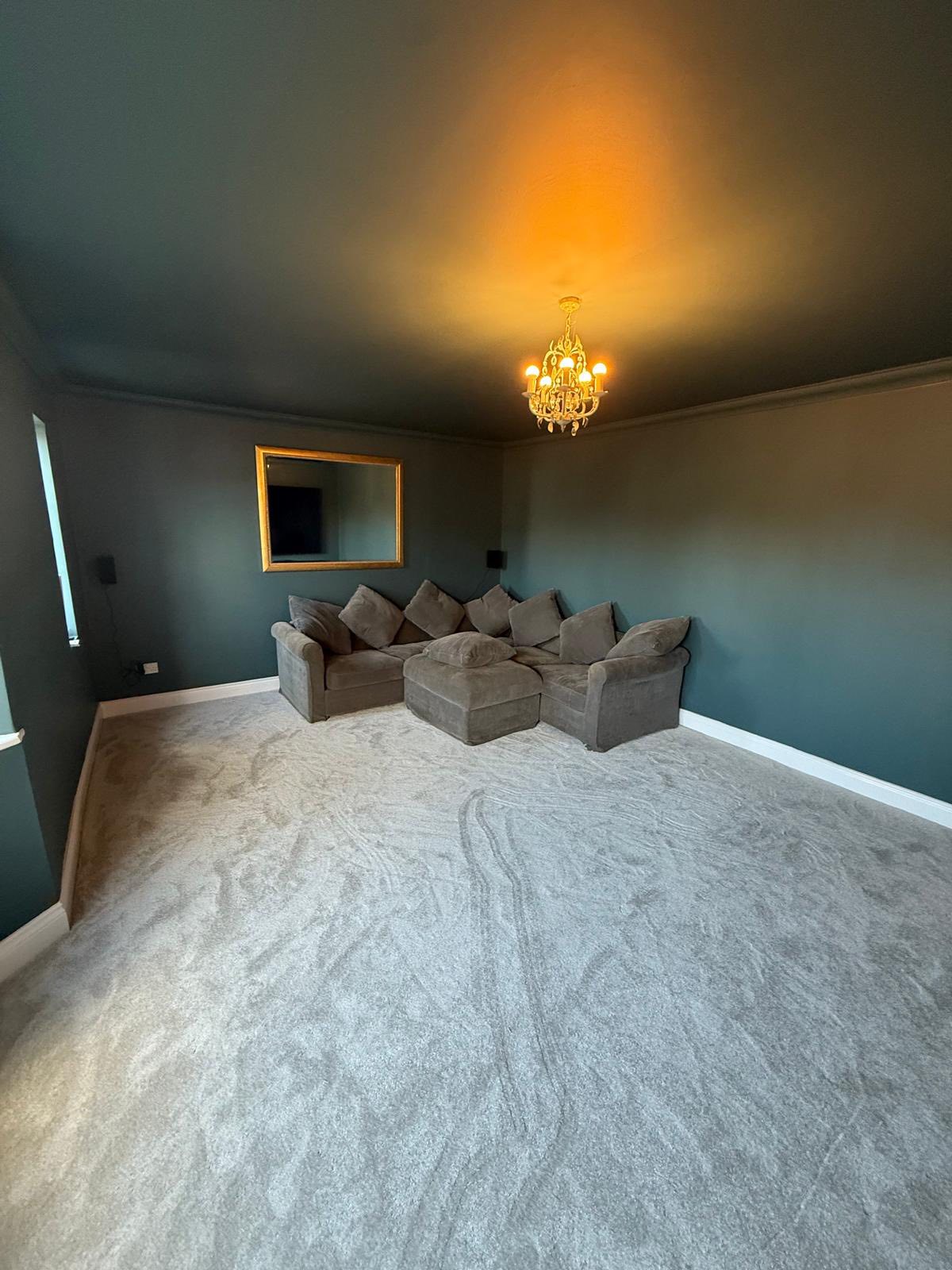 Newly decorated living room with feature wall