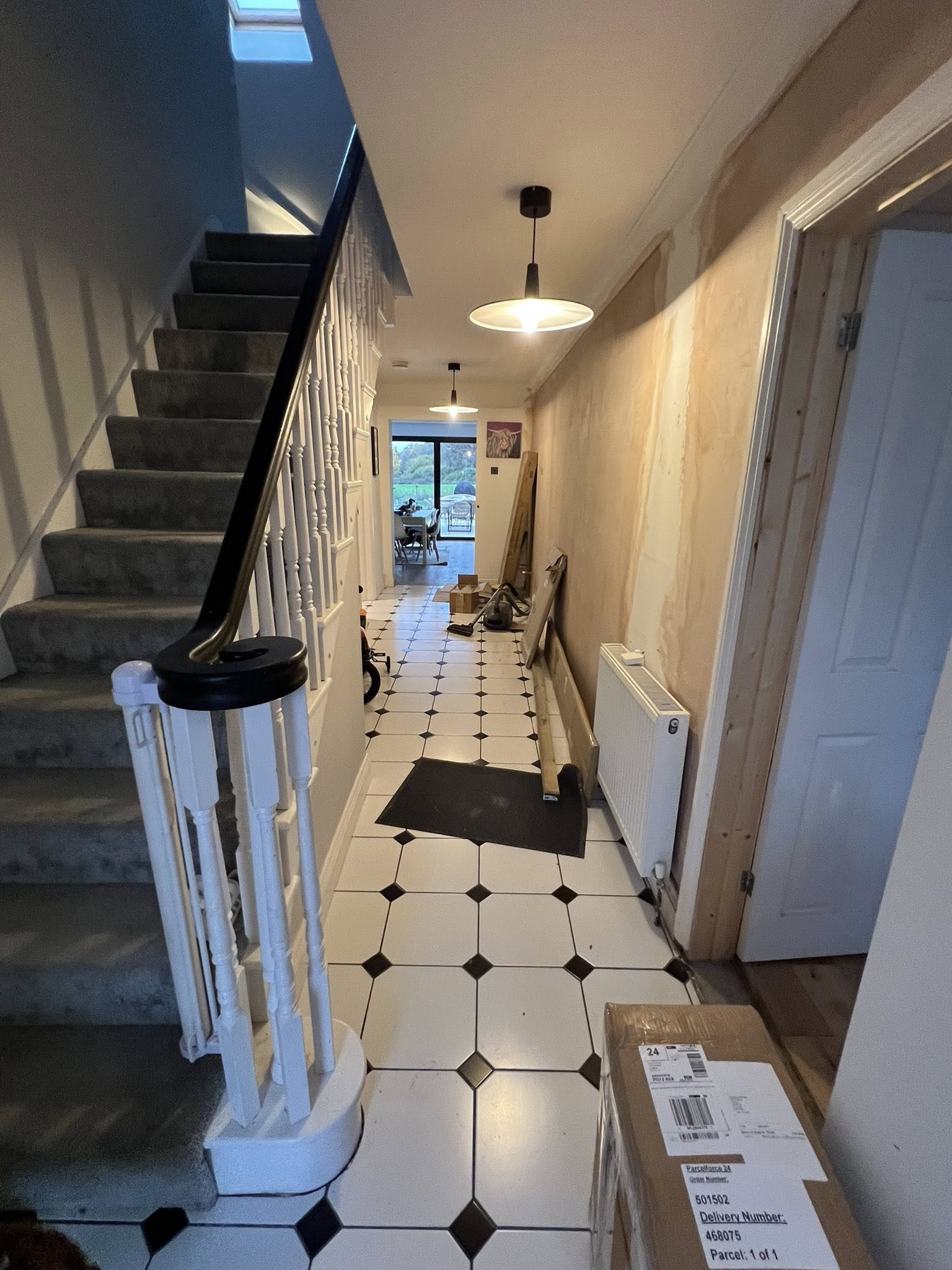 Modern hallway with geometric tile flooring